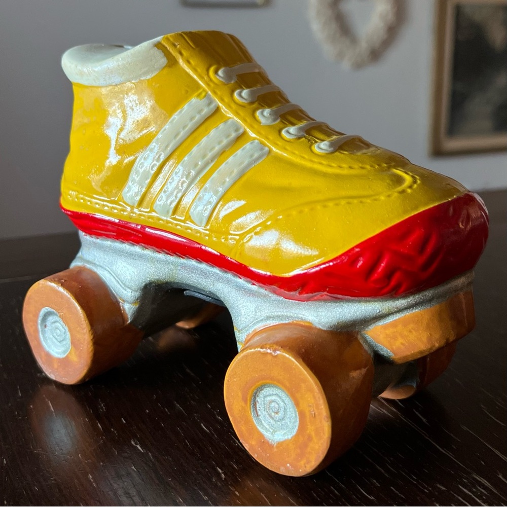 Vintage, roller derby skate piggy bank. RARE yellow color